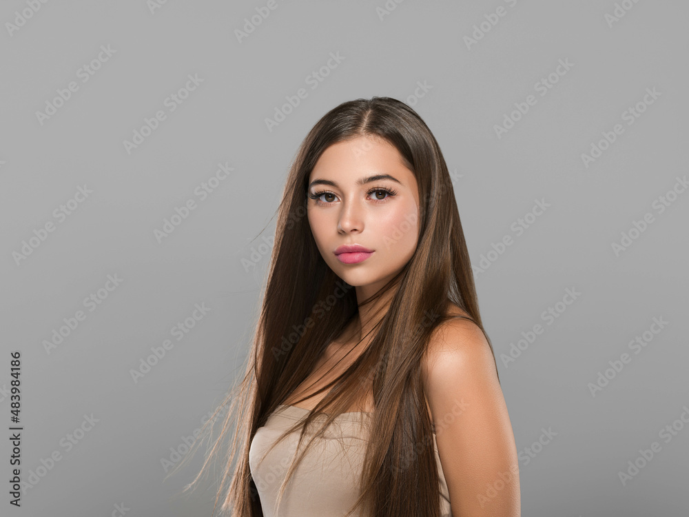 Beautiful freckles woman healthy hair long smooth brunette hairstyle Color background Beautiful freckles woman healthy hair long smooth brunette hairstyle Color background
