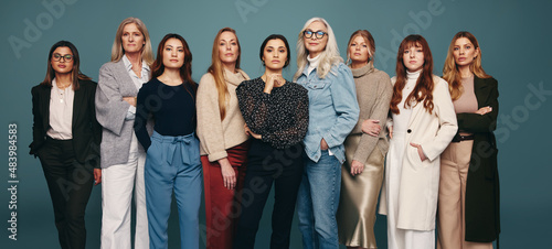 Diverse group of women standing in a row photo