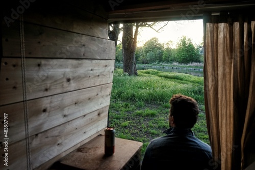 Enjoying vanlife and drinking a beer
