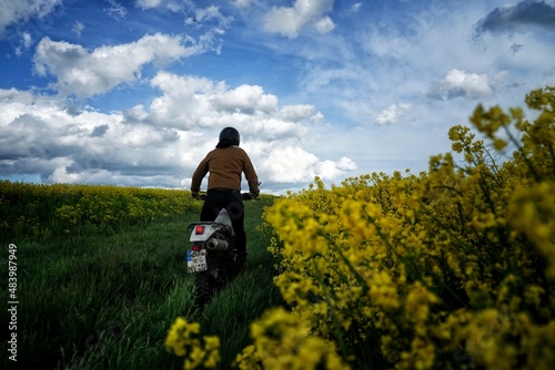 Motorcycle rider in spring flowers