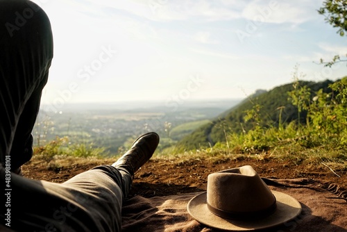 Leather boots and view from a small mountain