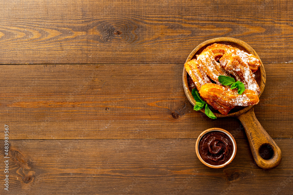 Spanish churros waffles with chocolate and sugar Spanish churros waffles with chocolate and sugar