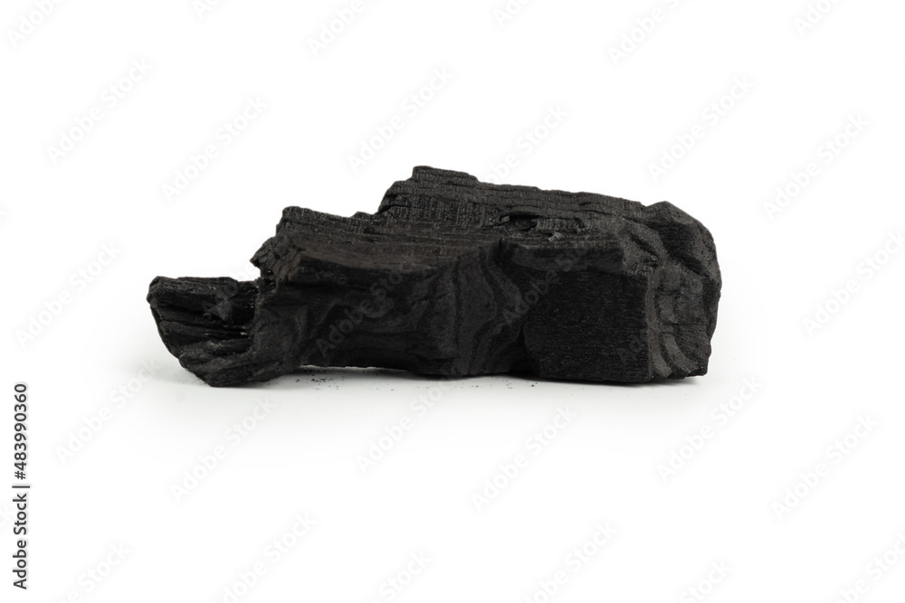Black oak coal isolated on white background.