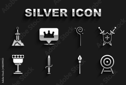 Set Dagger, Medieval shield with swords, Target arrow, spear, goblet, Magic staff, Sword in the stone and Location king crown icon. Vector