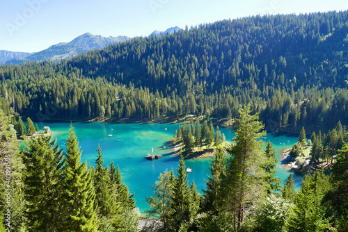 Aerial view of beautiful Lake Cauma with turquoise water. Grisons, Graubuenden, Switzerland.