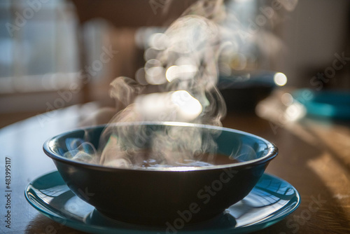 steaming hot food for a cold day backlit