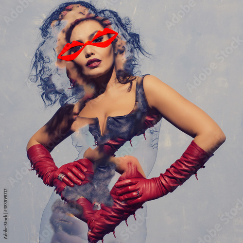 Abstract contemporary art collage luxurious Asian woman posing in black leather dress and red gloves with red glasses lips shape on face