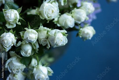 Bouquet of flowers on a blue background