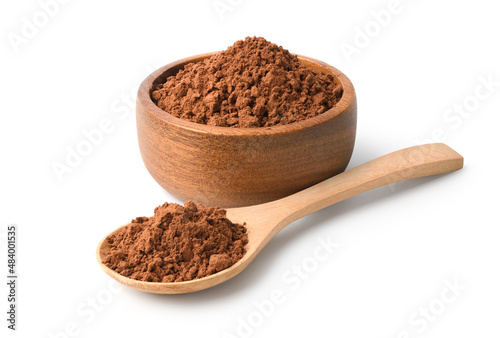 Cocoa powder in wooden bowl and spoon isolated on white background. photo