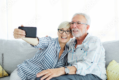 senior couple taking selfie happy elderly retired portrait mobile phone smartphone technology love photo © Lumos sp
