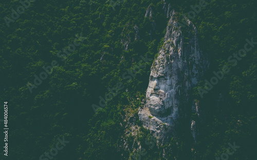 Decebalus head carved into the mountain photo