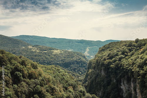 Landscape views of mountain forest and canyon - breathtaking mountain view panorama - abundant dense green vegetation