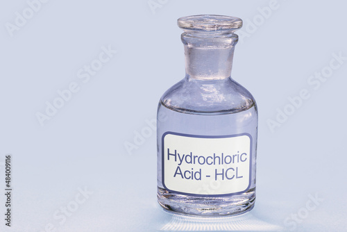 bottle of hydrochloric acid, a chemical solution used in cleaning and galvanizing metals, in tanning leather and obtaining various products photo