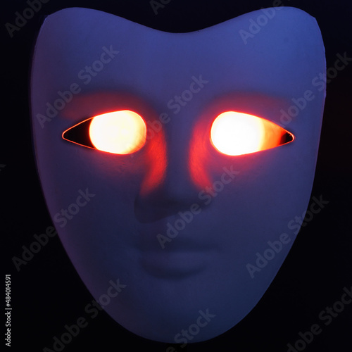 Blue Mask with Glowing Eyes