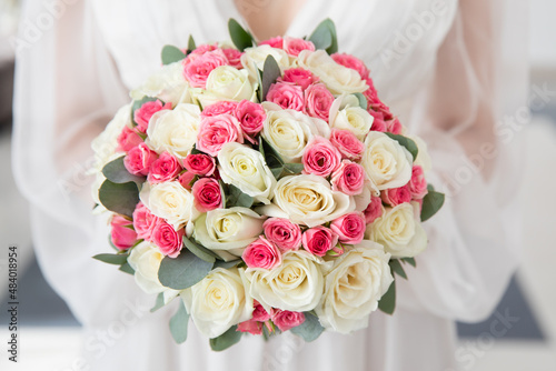 Bride with wedding bouquet  closeup