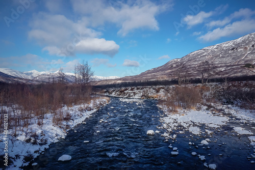 Mountain river and winter landscape