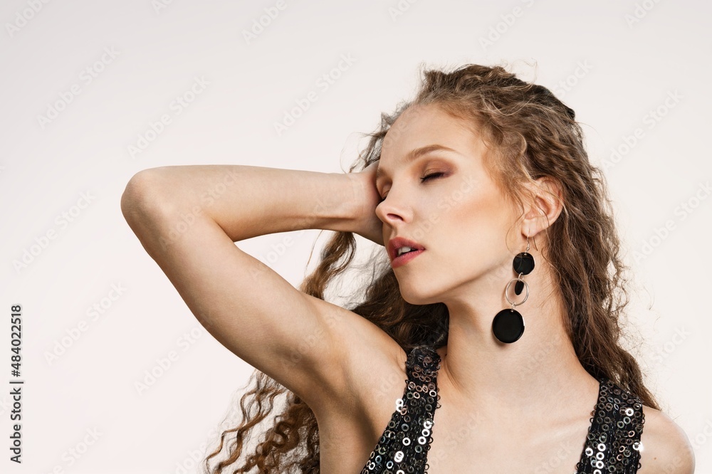 Obraz premium Beautiful Young woman lifting hands up to show off clean and hygienic armpit, Smooth armpit cleanliness and protection concept