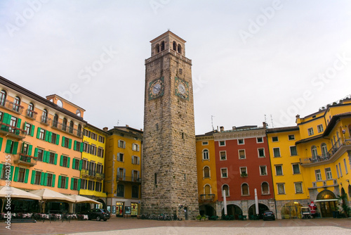The historic Piazza Tre Novembre square in centrral Riva del Garda in the Trentino-Alto Adige region of Italy in winter. The medieval Torre Apponale in the centre dates back to the 13th century
 photo