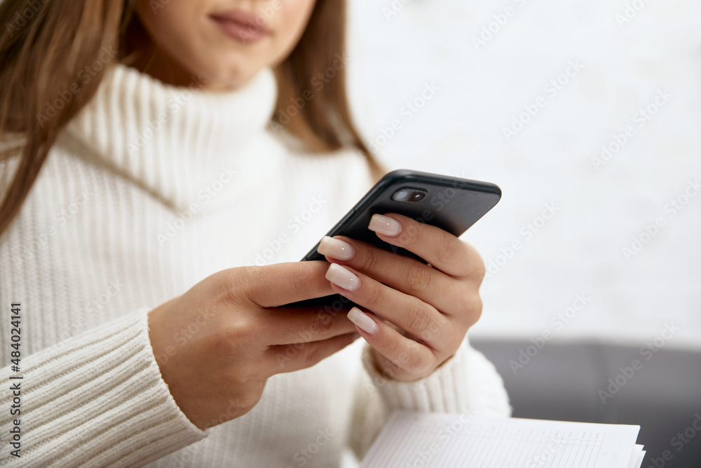 Woman using phone. Girl typings on smartphone Woman using phone. Girl typings on smartphone