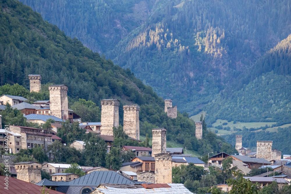 Obraz premium Panoramic view on the Svan towers in Mestia, a highland townlet, located in the High Caucasus, Svaneti Region in Georgia.The Svan watch towers have a unique defensive architectural structure. Rural