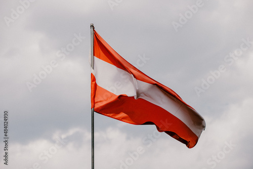 National flag of Austria blows in the wind, close-up