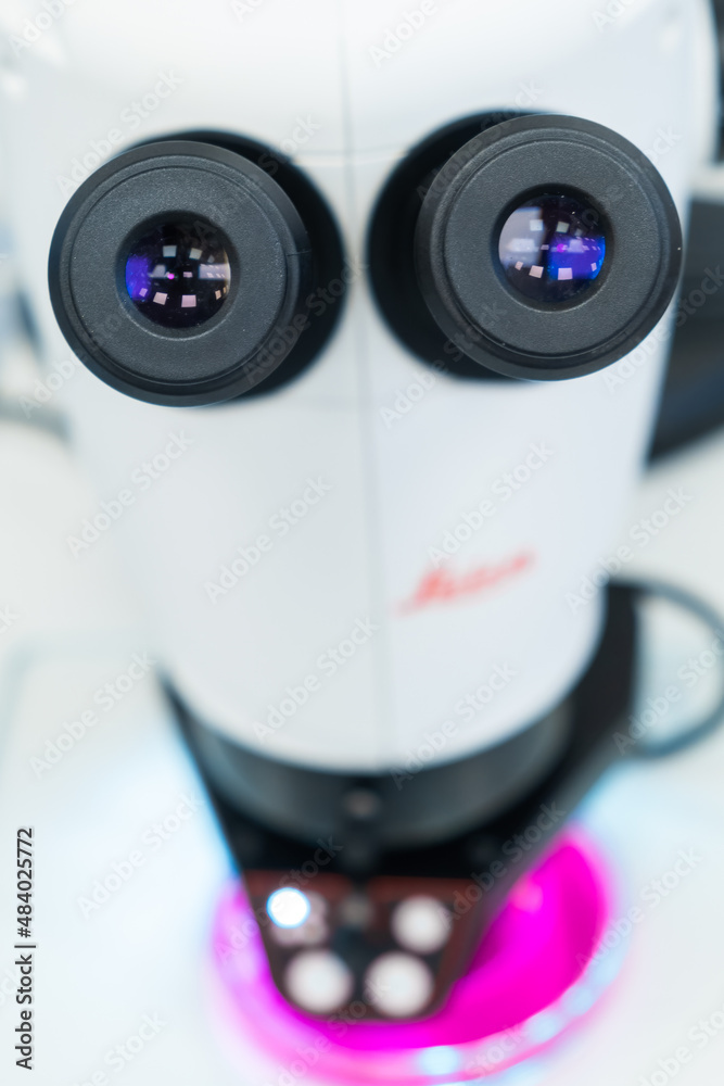 Close up laboratory microscope to analyze the sample. Close up laboratory microscope to analyze the sample.