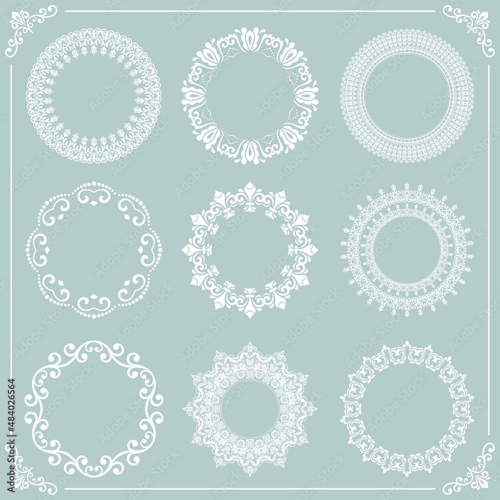 Vintage set of round elements. Different white round elements for design frames, cards, backgrounds and monograms. Classic patterns. Set of vintage patterns