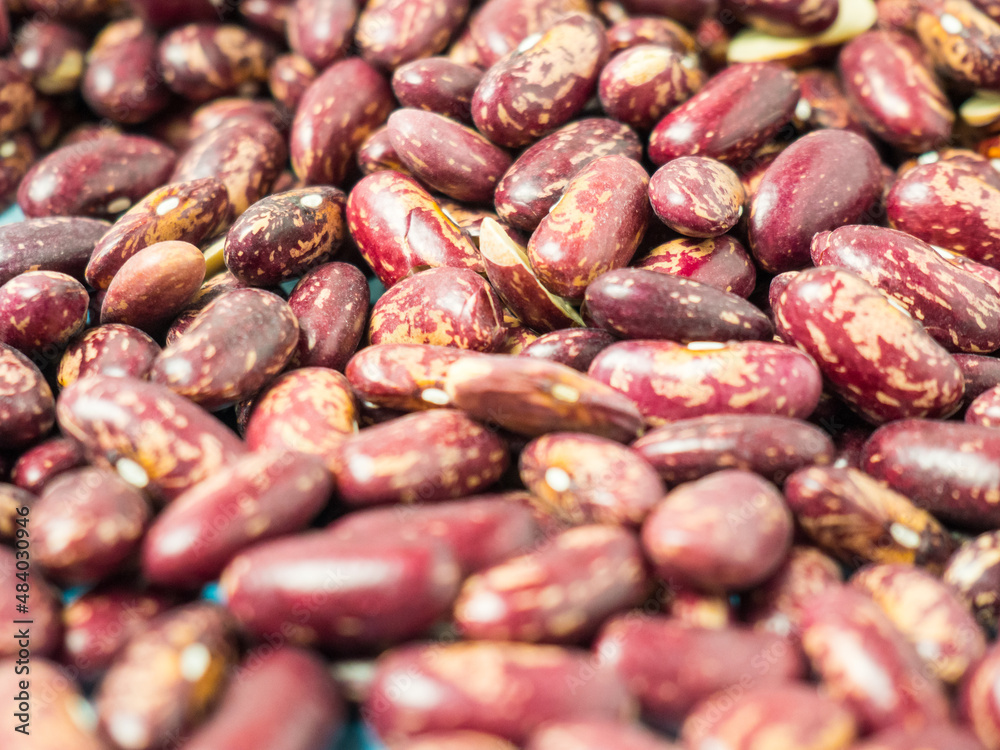 Dried red speckled beans for background and text Dried red speckled beans for background and text