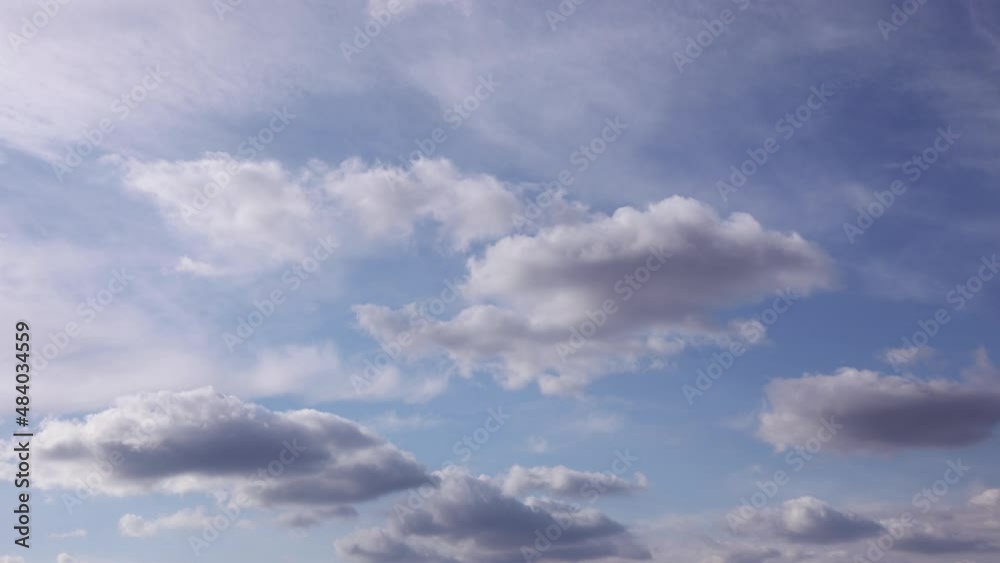 Timelapse shooting clouds form and break up in the sky in a windy weather Timelapse shooting clouds form and break up in the sky in a windy weather