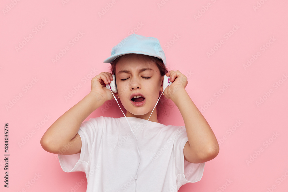 pretty young girl wearing headphones posing emotions isolated background pretty young girl wearing headphones posing emotions isolated background