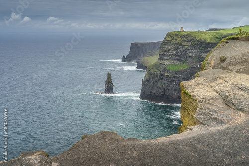 Sea stack next to Obrians Tower on iconic Cliffs of Moher, popular tourist attraction, Wild Atlantic Way, Co. Clare, Ireland