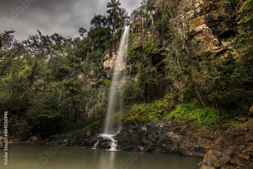 Sutile water drop in Cataratas del Iguazú National Park, called Salto Escondido (hidden jump) between the jungle forest in Iguazú, Misiones, Argentina 