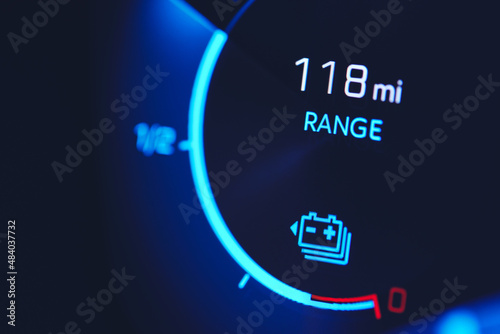 Close-in shot of electric car battery range gauge photo