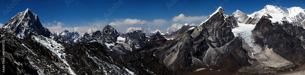 Panorama of mountains and snow in the Himalayas trekking along Everest Circuit in Nepal. Panorama of mountains and snow in the Himalayas trekking along Everest Circuit in Nepal.