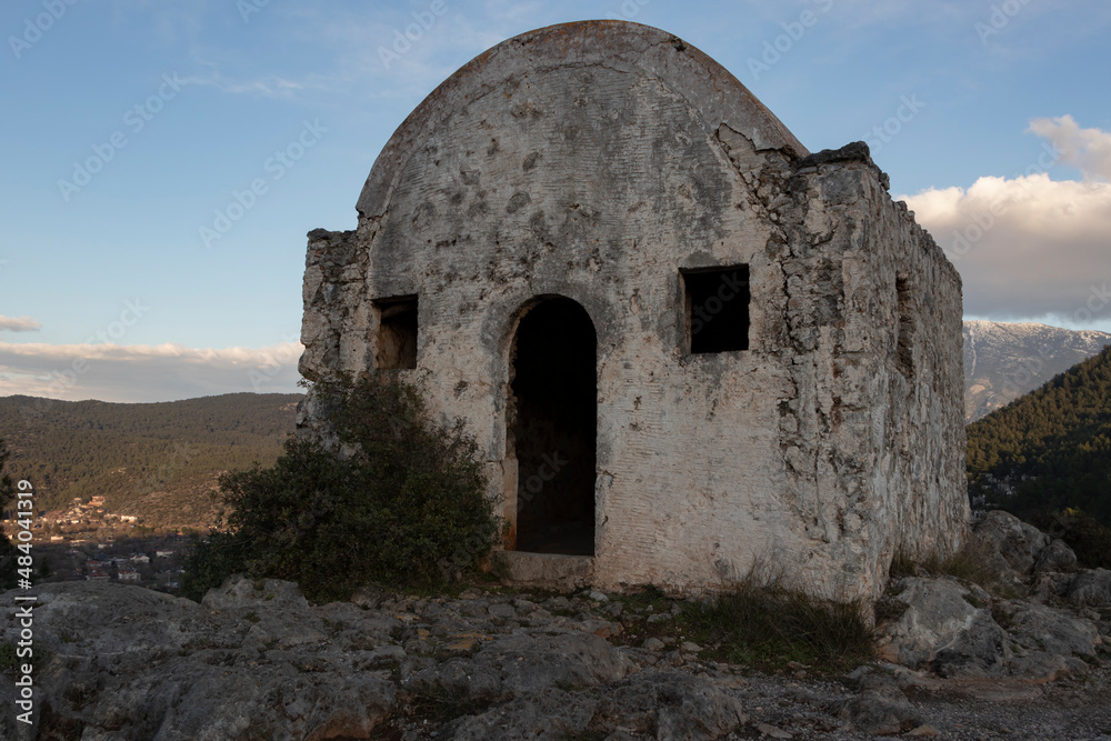 Old church on top of the mountain the ghost town of Kayakoy, Olu Deniz, Turkey.