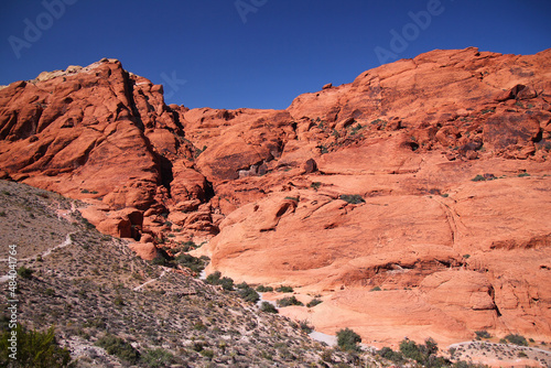 The Red Rock mountains with the peaks on the clear blue sky in the Canyon