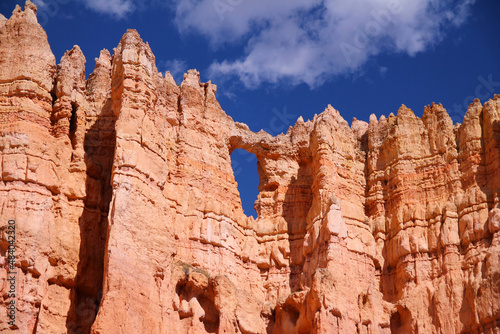 A hearth shaped window in the red rock hoodoos of the Bryce Canyon National Park