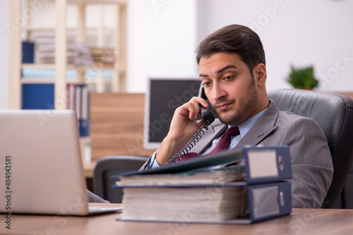 Young businessman employee working in the office