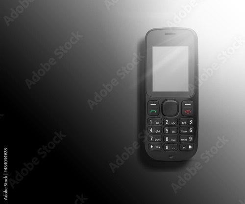 Wallpaper Mural Old retro mobile phone on dark background Torontodigital.ca