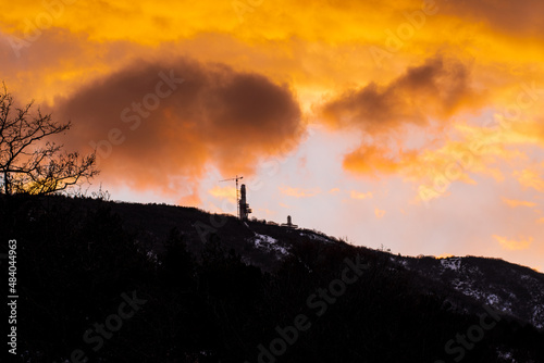 fire in the sky above the cross in Skopje on top of Mountain Vodno