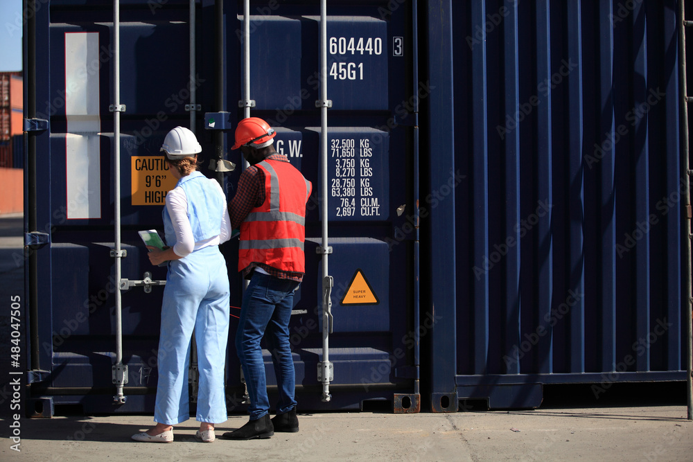 engineer working in container area logistics transportation import export or shipping industry , delivery and logistics concept container truck transport or free-zone area engineer working in container area logistics transportation import export or shipping industry , delivery and logistics concept container truck transport or free-zone area