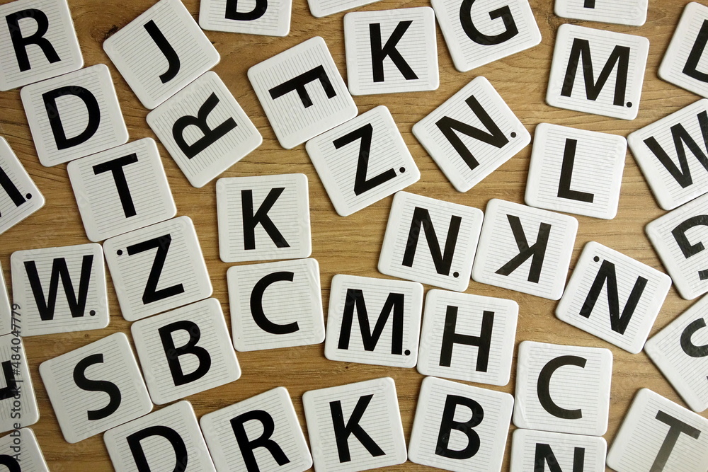 Consonants lying on school desk Consonants lying on school desk