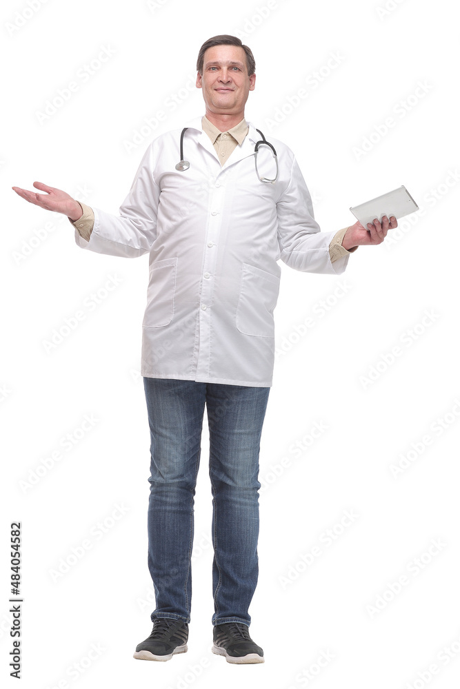 Front view of serious doctor working on a digital tablet Front view of serious doctor working on a digital tablet