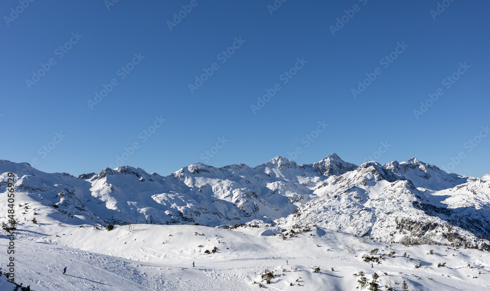 mountain peaks covered with snow ski resort