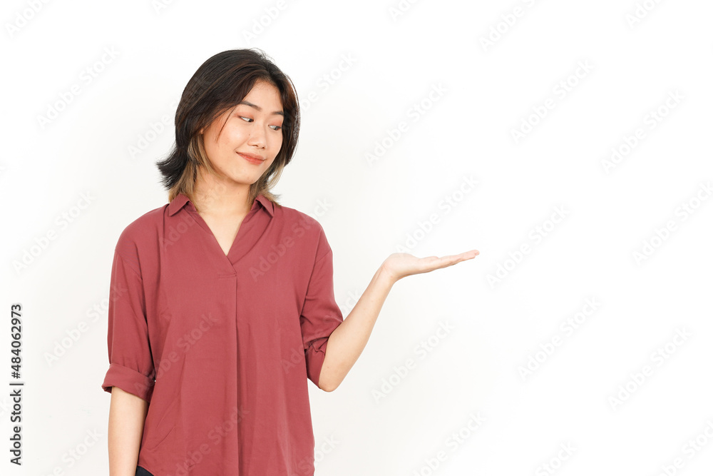 Showing and Holding Product on Open Palm Of Beautiful Asian Woman Isolated On White Background Showing and Holding Product on Open Palm Of Beautiful Asian Woman Isolated On White Background
