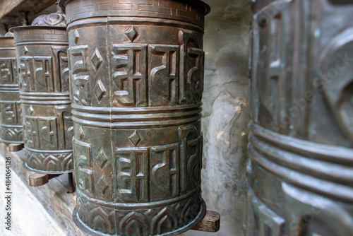 Buddhist prayer wheels, close up.