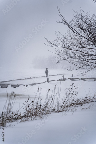 Lonely person on docks