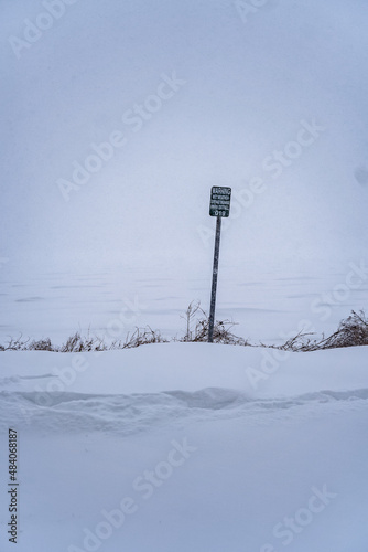 Sign post in white snow