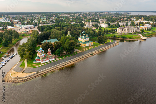 Picturesque summer landscape of Russian town of Uglich overlooking Orthodox cathedrals in green park area of ancient Kremlin on Volga river, Yaroslavl Oblast