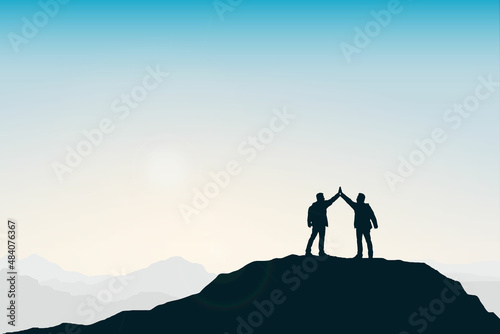 Silhouette group of people congratulating success on top of mountain. Sky background. Teamwork  target and goal concept. 